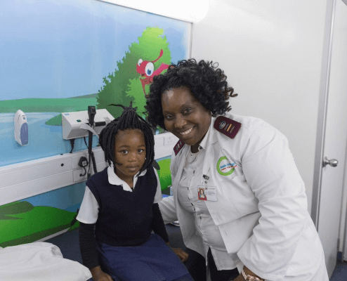 Patient and practitioner smiling